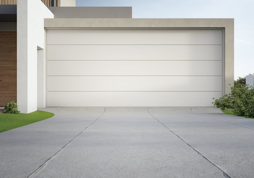 concrete driveway costs- Modern house and big garage with concrete driveway. 3d illustration of residential building exterior.