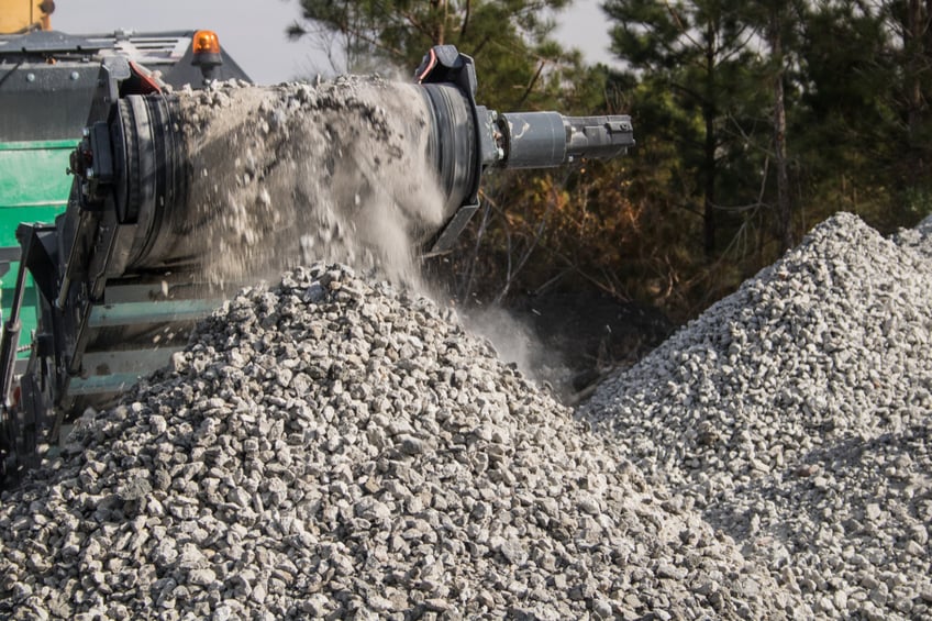 Concrete being crushed 