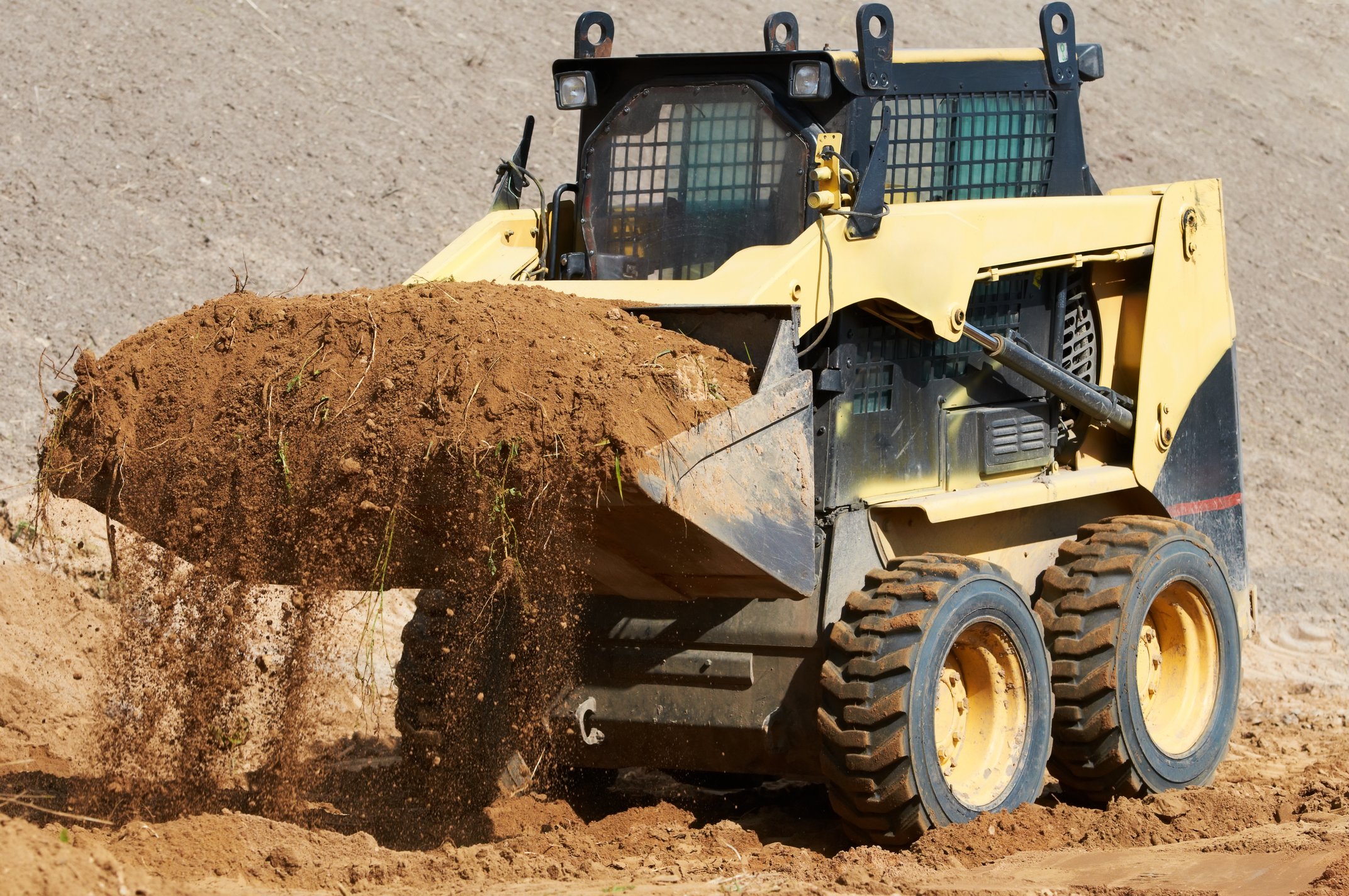 Skid Steer vs Tractor: Agriculture & Construction Applications | iseekplant